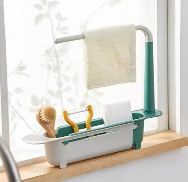 Adjustable kitchen sink organizer with soap, cleaning brush, sponge holder and towel bar
